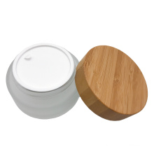Hot selling 15g 30g 100g 200g clear frosted glass jar with wood bamboo cap inside lid